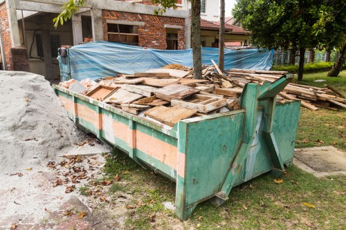 Professional rubbish removal truck in Catford neighborhood